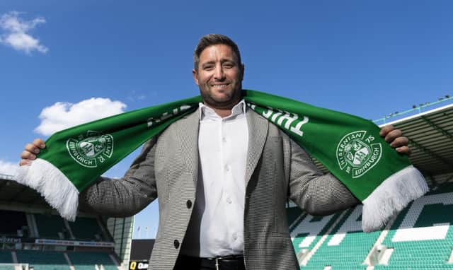 Lee Johnson waves the scarf but there weren't too many ither first-day cliches when he took over at Hibs