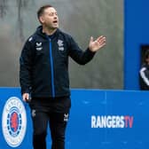 New manager Michael Beale oversees a Rangers training session at Auchenhowie.