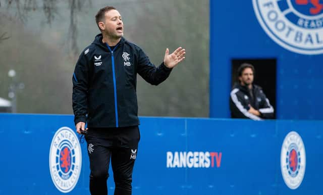New manager Michael Beale oversees a Rangers training session at Auchenhowie.