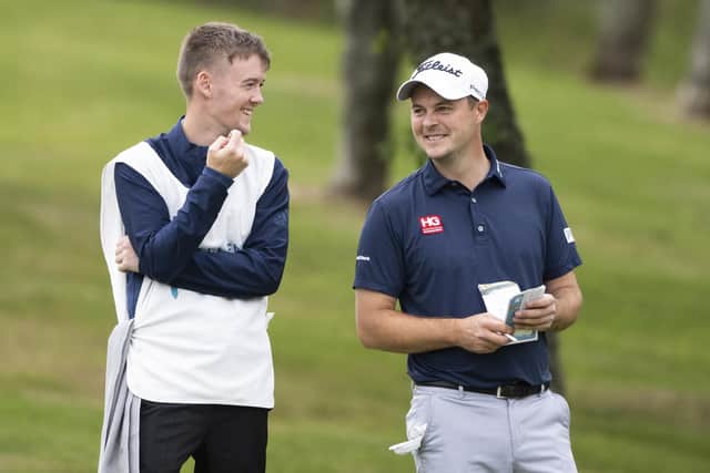 Jack McDonald shares a laugh with his caddie during the opening round of the Farmfoods Scottish Challenge supported by The R&A at Newmachar Golf Club. Picture: Paul Devlin/Getty Images