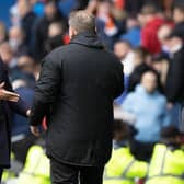 Rangers manager Giovanni van Bronckhorst with his Celtic counterpart Ange Postecoglou after the Scottish champions' lost 2-1 in the Old Firm clash at Ibrox.  (Photo by Craig Williamson / SNS Group)