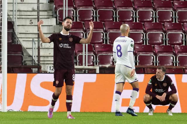 Hearts Orestis Kiomourtzoglou and Andy Halliday were frustrated figures as the Tynecastle side suffered Europa Conference League defeat against Fiorentina. Photo by Ross Parker / SNS Group