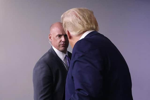 President Donald Trump was escorted from his press briefing by Secret Service agents (Getty Images)