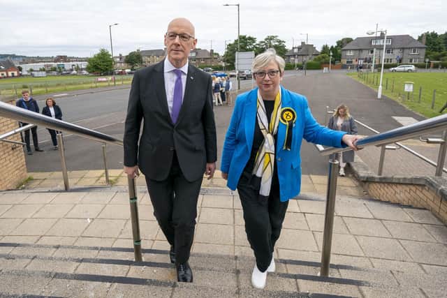 First Minister and SNP leader John Swinney campaigning with the party's Edinburgh South West candidate Joanna Cherry on the General Election campaign trail last month. Photo: Jane Barlow/PA Wire