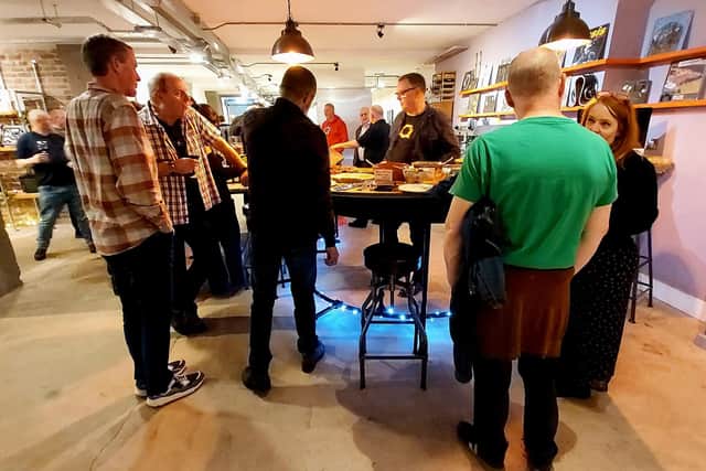 Customers and staff gathering for the 25th anniversary event, which took place in early December.