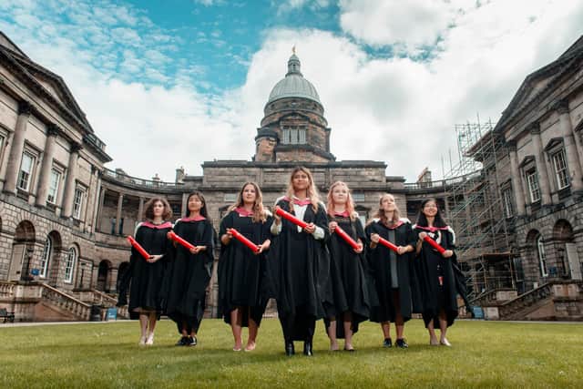 EDINBURGH, UK - July 2018: Seven students who blazed a trail for women’s access to higher education are to be awarded posthumous honorary degrees on Saturday 6th July, 150 years after beginning their studies. The group – known as the Edinburgh Seven – were among the first women admitted to a UK university when they enrolled to study medicine at the University of Edinburgh in 1869. The women faced substantial resistance from their male peers and were ultimately prevented from graduating and qualifying as doctors. Pictured at Old College, seven current students at Edinburgh Medical School will collect the degrees on behalf of the women.
The modern-day students who collected the honorary degrees on behalf of the Edinburgh Seven last year - Violet Borkowska, Hikari Sakurai, Megan Cameron, Simran Piya, Caitlin Taylor, Izzie Dighero and Mei Yen Liew - were reunited for the new work of art. Picture: Calum Bennetts
