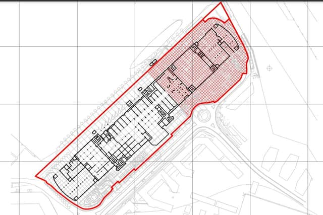 The shaded area on the drawing is labelled 'demolition area'