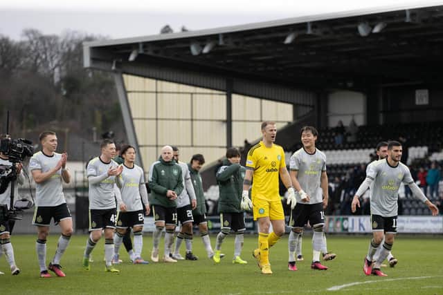 The Celtic players take the acclaim of the travelling support after a come-from-behind 5-1 success over St Mirren in Paisley.