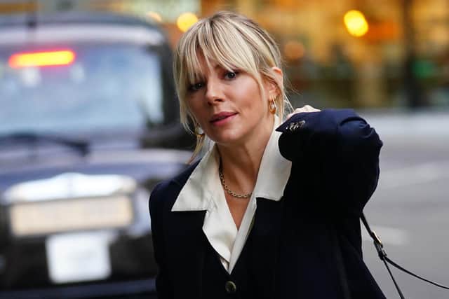 Sienna Miller arrives the Rolls Building in London, where a number of celebrities have settled phone hacking claims against News Group Newspapers, publisher of the now defunct News of the World. Picture date: Thursday December 9, 2021.