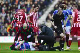 St Johnstone striker Nicky Clark was sent off for a challenge on Rangers midfielder Ryan Jack  (Photo by Rob Casey / SNS Group)