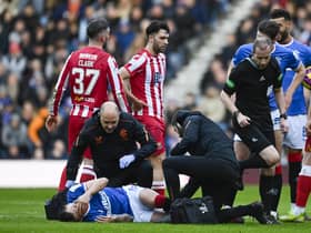 St Johnstone striker Nicky Clark was sent off for a challenge on Rangers midfielder Ryan Jack  (Photo by Rob Casey / SNS Group)