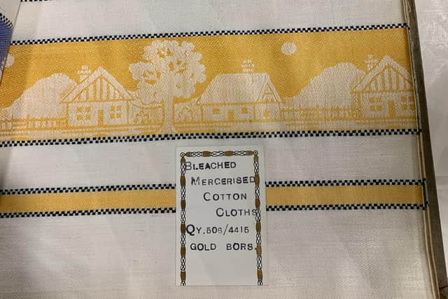 Inside a linen sample book produced when Dunfermline was a world leader in production in the 19th Century. PIC: OnFife