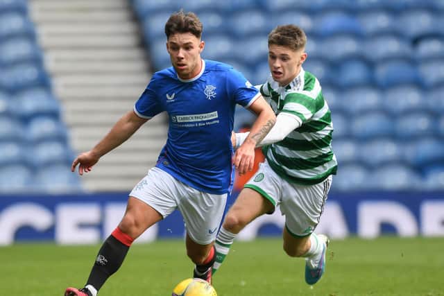 Rangers' Arron Lyall (L) and Celtic's MacKenzie Carse in action during Lowland League match between Rangers B and Celtic B at Ibrox on April 2, 2023 (Photo by Craig Foy / SNS Group)