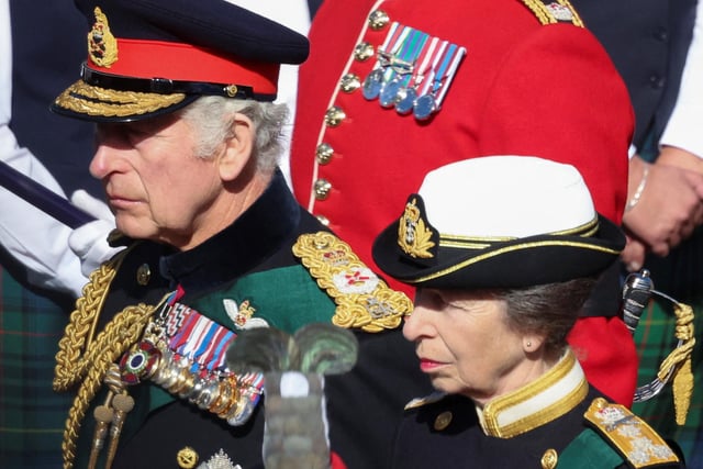 King Charles III and the Princess Royal walk behind Queen Elizabeth II's coffin during the procession from the Palace of Holyroodhouse to St Giles' Cathedral, Edinburgh.