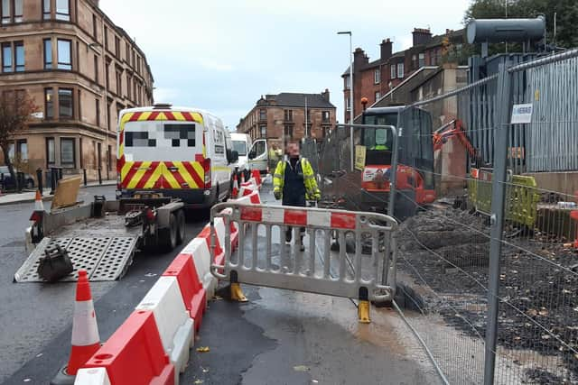 Construction of new segregated cycle lanes on the diversion route on Old Dumbarton Road was still incomplete on Thursday because of work on a new electricity sub-station. Picture: The Scotsman