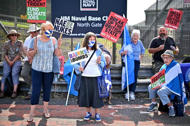 Protesters gather for an independence rally campaigning for nuclear disarmament at the North Gate of Her Majesty's Naval Base in Helensburgh. Picture: Jeff J Mitchell/Getty Images