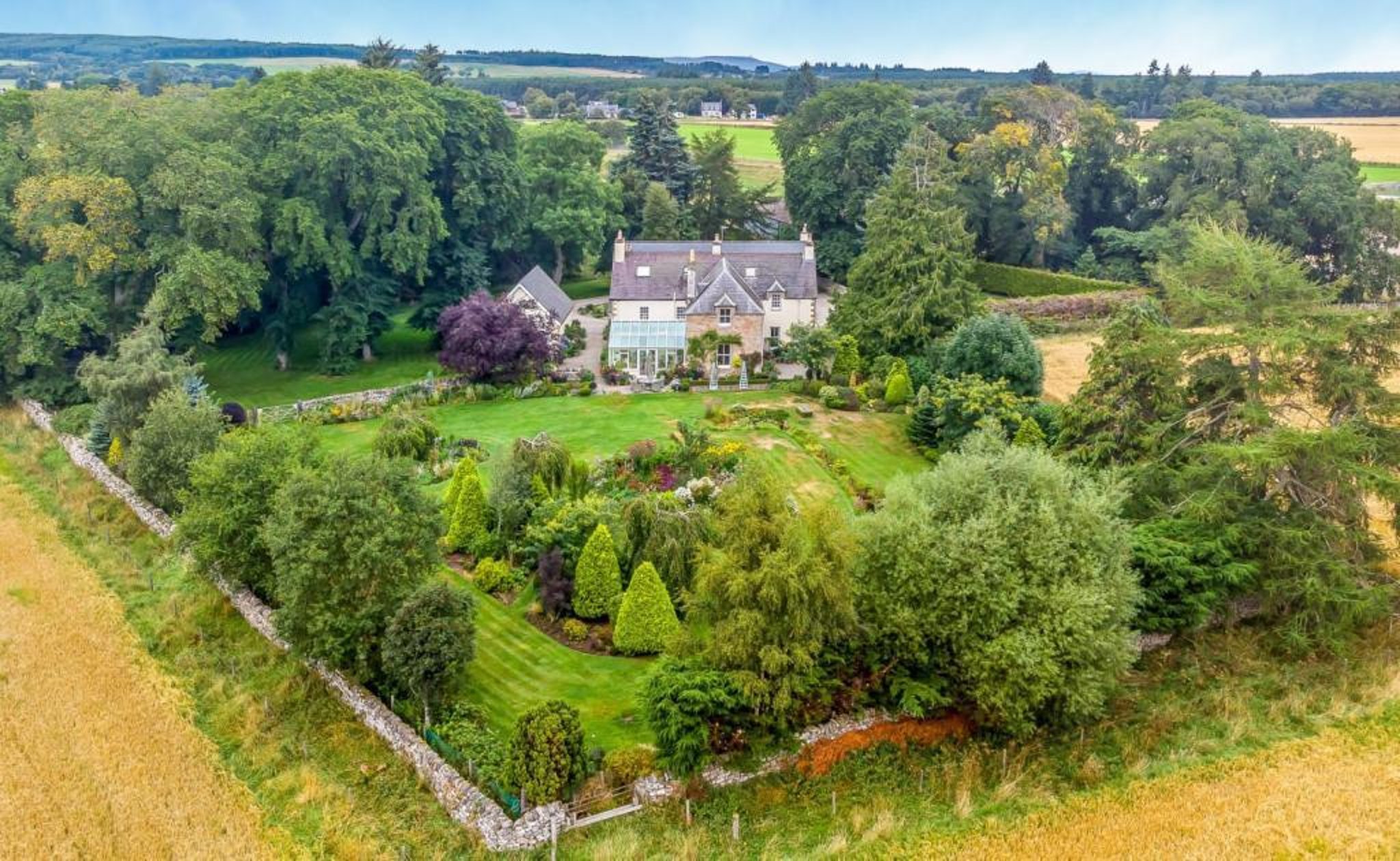 Picture perfect 5-bedroom farmhouse in glorious Highlands setting with beautiful gardens and river with fishing rights