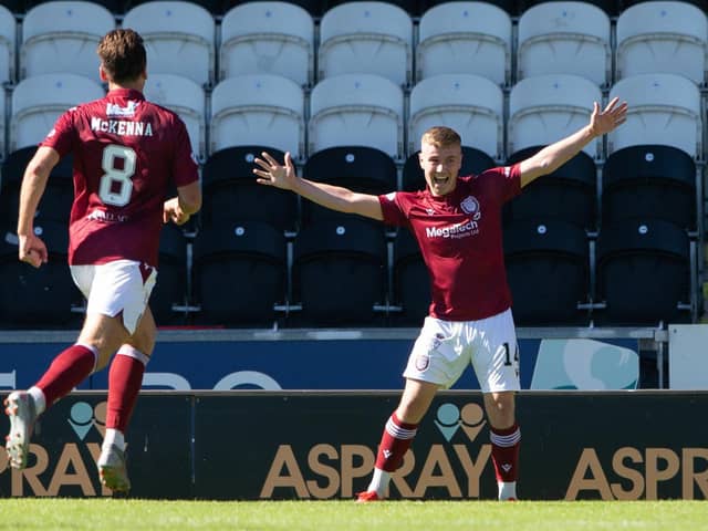 Arbroath's Dylan Patterson (c) celebrates scoring a late winner at St Mirren. (Photo by Ewan Bootman / SNS Group)