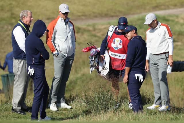 Brooks Koepka asks for a rules decision on the 15th hole during the Saturday morning foursomes in the 43rd Ryder Cup at Whistling Straits. Picture: Warren Little/Getty Images.