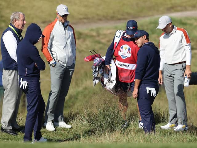 Brooks Koepka asks for a rules decision on the 15th hole during the Saturday morning foursomes in the 43rd Ryder Cup at Whistling Straits. Picture: Warren Little/Getty Images.