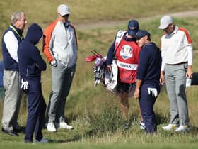 Brooks Koepka asks for a rules decision on the 15th hole during the Saturday morning foursomes in the 43rd Ryder Cup at Whistling Straits. Picture: Warren Little/Getty Images.