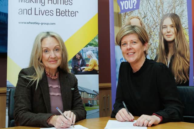 Sharon McIntyre, Chief Executive of MCR Pathways, and Lynne Michell, Director of Wheatley Foundation, sign the new protocol.