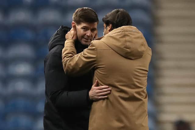 Rui Costa speaks to Steven Gerrard at full-time.