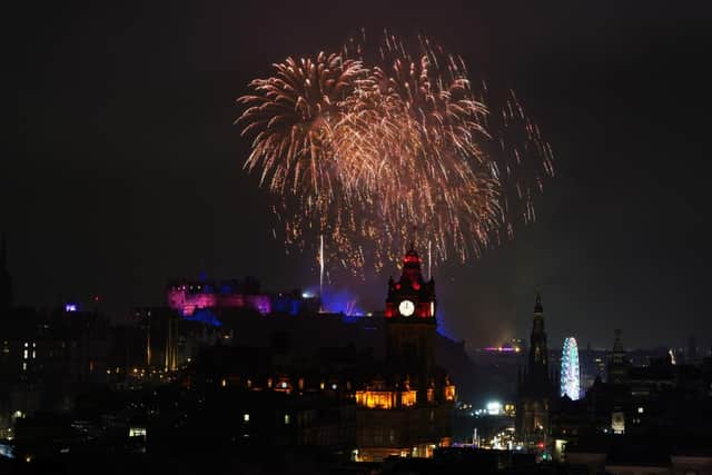 Fireworks exploded over Edinburgh Castle as the city's Hogmanay festival returned. Picture: Andrew Milligan/PA Wire