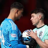 Aberdeen goalkeeper Kelle Roos had words with Hibs striker Kevin Nisbet before the penalty miss.