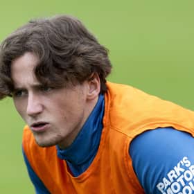 Rangers youngster Alex Lowry has joined Hearts on a season-long loan.