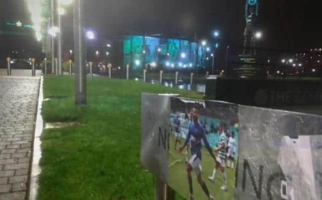 A poster of Connor Goldson celebrating put up near Celtic Park.