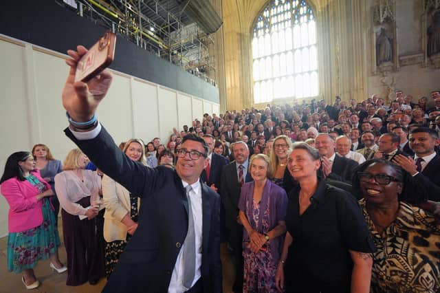 Andy Burnham taking a selfie with his new Labour colleagues in Westminster Hall.