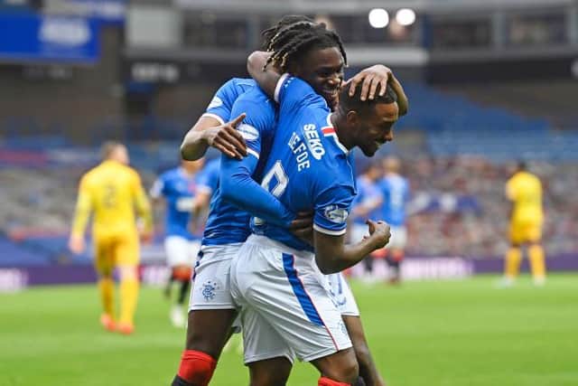 Jermain Defoe celebrates his goal with Calvin Bassey during a Scottish Premiership match between Rangers and Livingston at Ibrox Stadium, on October 25, 2020, in Glasgow, Scotland. (Photo by Rob Casey / SNS Group)