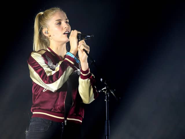 Hannah Reid of London Grammar; the Ivor Novello Award-nominated act are set to headline Latitude Festival this weekend at Henham Park, Suffolk (Credit: Getty Images)