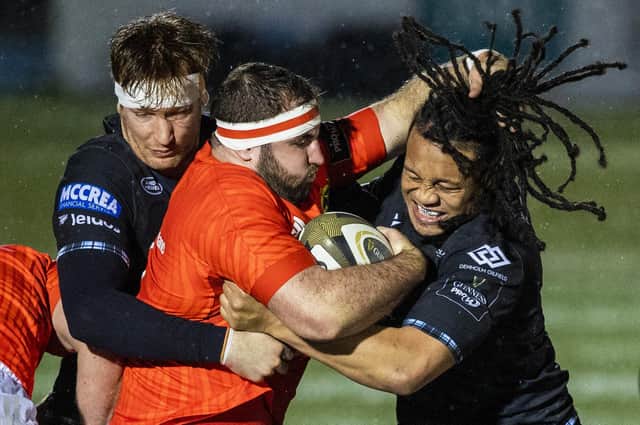 Glasgow Warriors' Rob Harley (left) and TJ Ioane battle with Munster's James Cronin. Picture: Craig Williamson / SNS