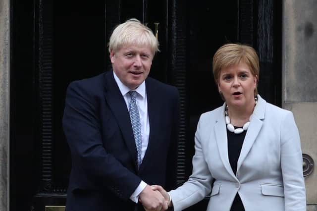 Both Boris Johnson and Nicola Sturgeon said they would be led by 'data, not dates' as they set out tentative plans to ease the Covid lockdown (Picture: Jane Barlow/PA Wire)