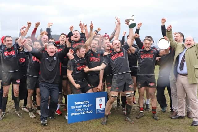 Biggar celebrate their National League Division 1 title triumph. The season was later voided.