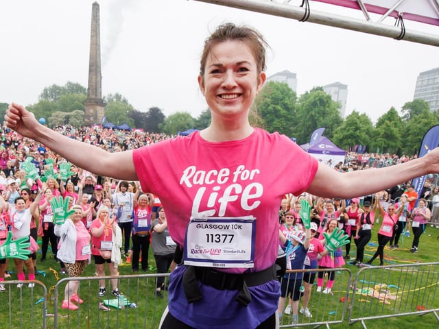 Laura Eggo, a mum from East Kilbride who was diagnosed with breast cancer just before her 40th birthday, took to the stage ahead of the Glasgow event as guest of honour. She ran the 10K with her husband, Brian. PIC: Steve Welsh.