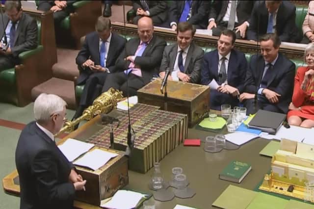 In 2015, the then Shadow chancellor John McDonnell offered a copy of Chairman Mao's Little Red Book (on table) to then Chancellor George Osborne (Picture: PA)