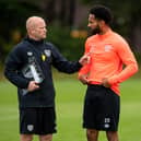 Hearts coach Gordon Forrest alongside Jordan Roberts.