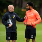 Hearts coach Gordon Forrest alongside Jordan Roberts.