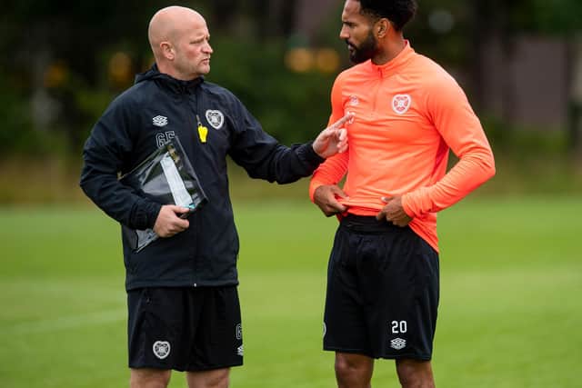 Hearts coach Gordon Forrest alongside Jordan Roberts.
