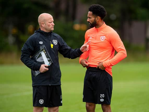 Hearts coach Gordon Forrest alongside Jordan Roberts.