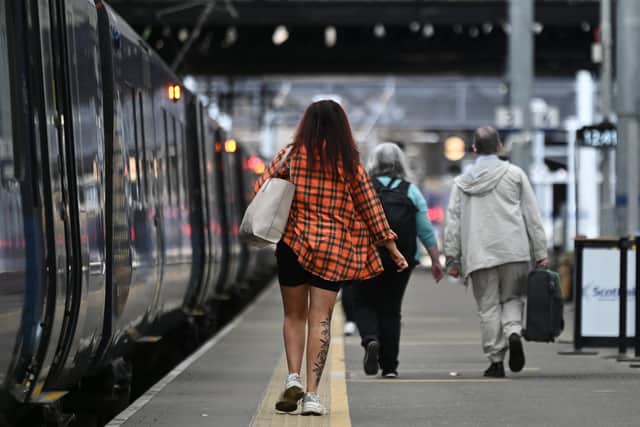 The report found that passengers who had been drinking were a key factor in women feeling unsafe travelling by train. Picture: John Devlin