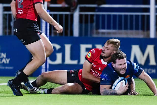 Edinburgh's Ewan Ashman scores a try on his debut during the win over Emirates Lions at the Hive Stadium. (Photo by Ross Parker / SNS Group)
