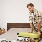 Don't overpack and you can save money on airline luggage fees (Picture: Adobe)