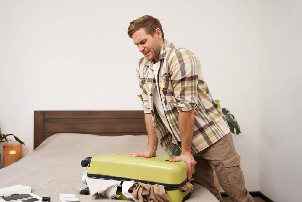 Don't overpack and you can save money on airline luggage fees (Picture: Adobe)