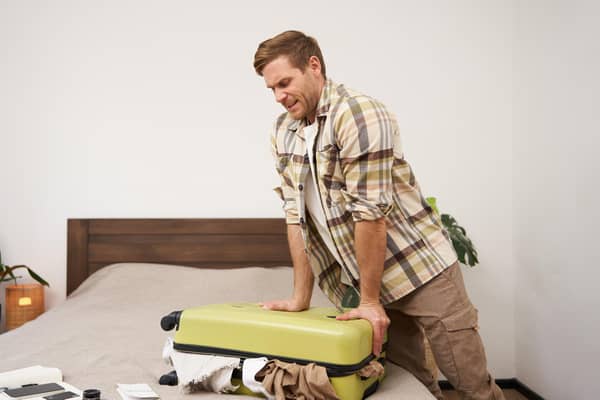 Don't overpack and you can save money on airline luggage fees (Picture: Adobe)