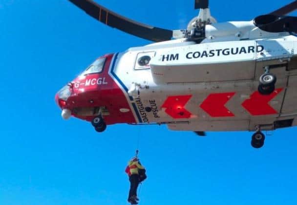 Twelve members of the team were carried up to the Cuillin Ridge by a Coastguard helicopter to search the area.