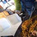 A portion of paella is served up from the Leith Walk pop-up venue. Picture: Ruairidh Mason